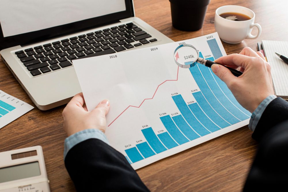 businessman-analyzing-growth-chart-office